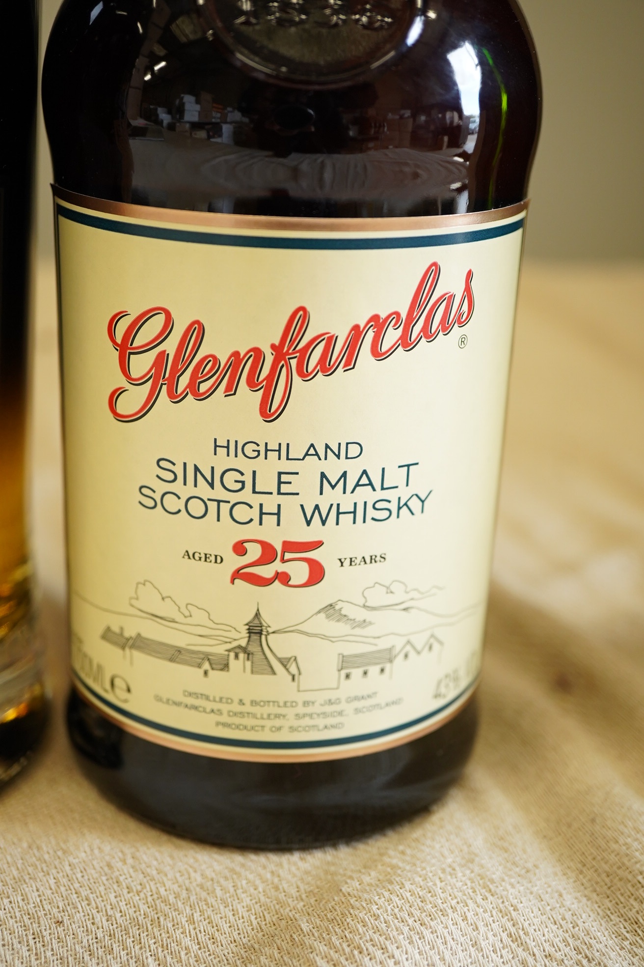 Whisky: 1 x Glenmorangie Signet, 46% abv, 70cl; 1 x Glenfarclas Single Malt 25 year old, 43% abv, 70cl (2)